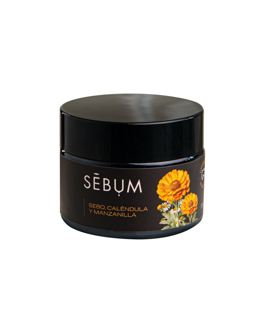 REAL-PHOTO | source: Drive Sebum/Fotografias/6.png | purpose: PDP gallery packshot dramatico | product: Balsamo FloreSer | variant: Sebo Caléndula y Manzanilla | packaging: frasco negro | date: 2026-07-08